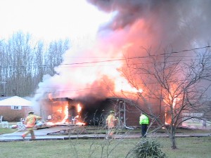 House fire with emergency responders on scene
